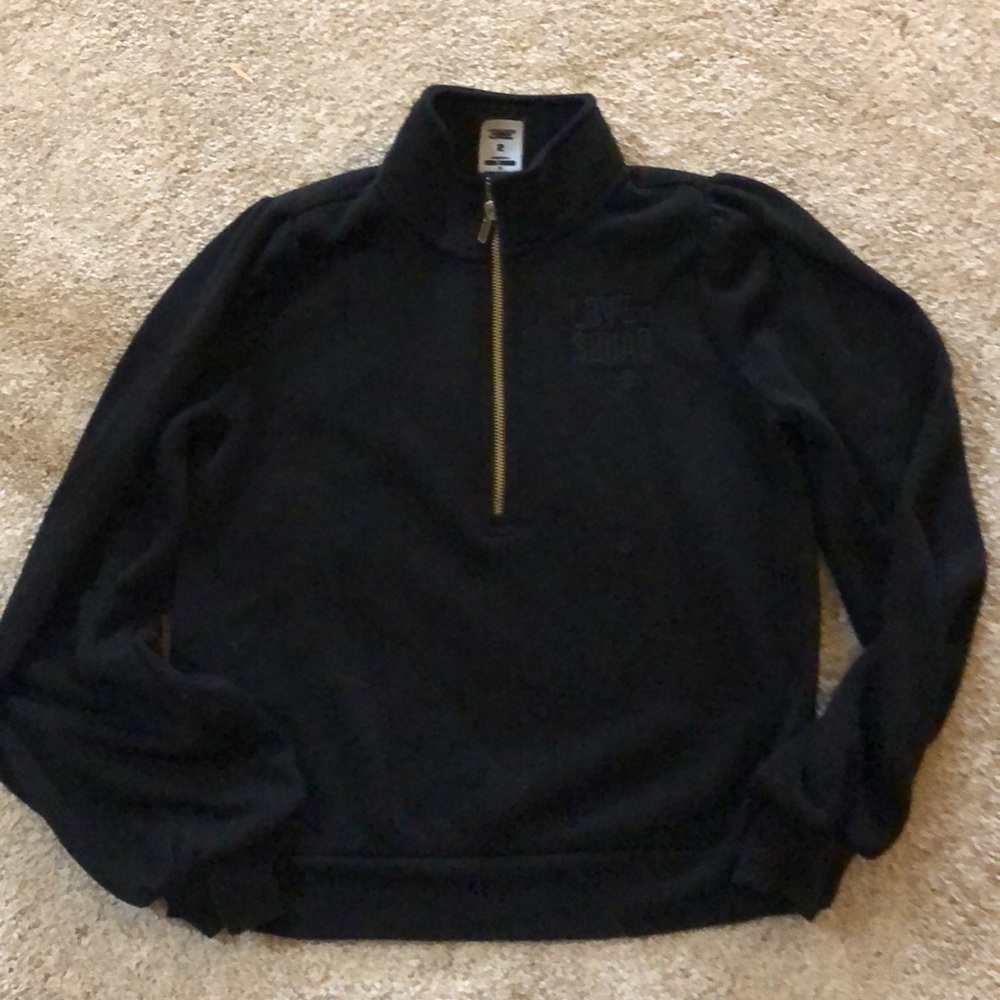 Black sipper front mock turtle neck jacket.
